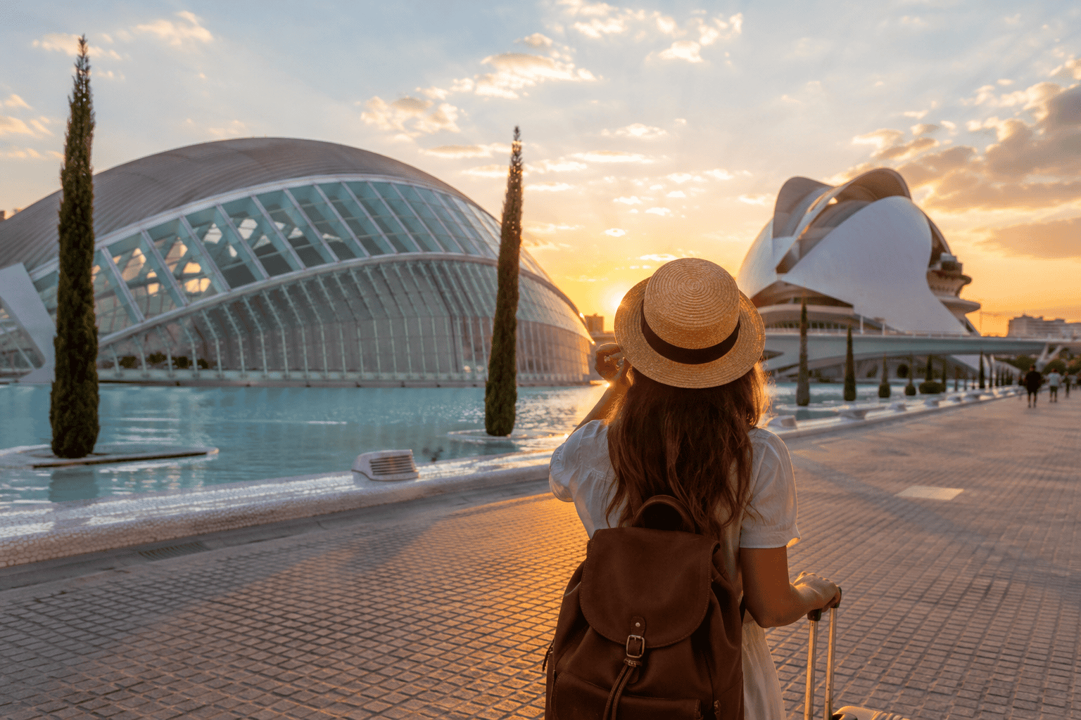 Generated image: Golden hour stroll by futuristic architecture