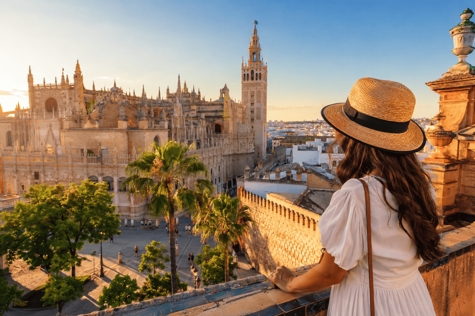 Generated image: Golden hour over Seville's cathedral skyline